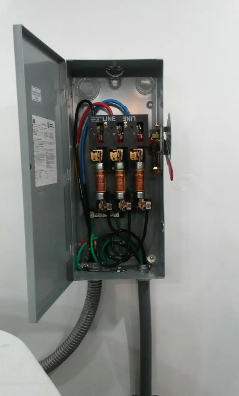 Three-phase disconnect switch installed for Smoke Detector Installation in Morton